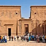 Marvel at the intricate carvings of the Philae Temple in Egypt, a testament to ancient Egyptian artistry and devotion