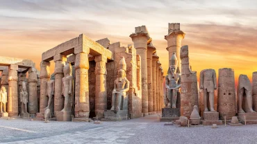 The Luxor Temple, a striking ancient Egyptian complex located on the east bank of the Nile River, exemplifies the grandeur of Pharaonic architecture.