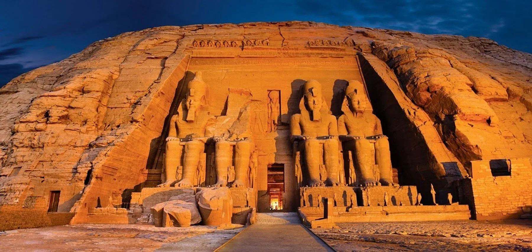 The Abu Simbel temples, carved into cliffs in southern Egypt, are iconic ancient monuments dedicated to Pharaoh Ramses II and Queen Nefertari.