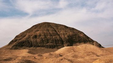 The Hawara Pyramid, built by Pharaoh Amenemhat III, is an ancient Egyptian structure known for its labyrinthine interior layout.