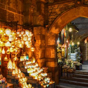 Khan El-Khalili is a vibrant bazaar in Cairo famed for its intricate handicrafts, aromatic spices, and historical ambiance.