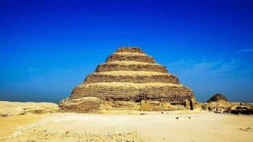 The Saqqara Step Pyramid, an ancient marvel in Egypt, represents the world's earliest large-scale cut stone construction and symbolizes powerful Egyptian innovation.
