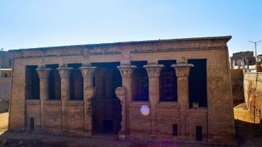 The Temple of Esna, an ancient Egyptian sanctuary dedicated to the god Khnum, boasts intricately detailed hieroglyphics and columns.