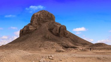 The Black Pyramid in Egypt, constructed during the reign of King Amenemhat III, is an ancient mudbrick structure covered in dark stone.
