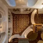An upward view of the highly detailed, ornate wooden and geometric Ceiling of Mausoleum of Sultan Qalawun, showing painted designs and intricate craftsmanship in Islamic Cairo.