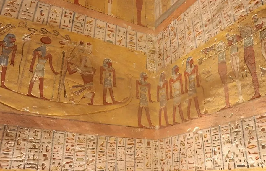 Detailed and colorful Hieroglyphics Inside the Tomb of Rameses VI, Valley of the Kings, depicting scenes and figures from ancient Egyptian mythology.
