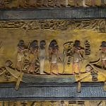 Intricate and well-preserved Reliefs and Paintings in the Tomb of Pharaoh Sety I in the Valley of the Kings, showing richly colored figures and hieroglyphics, including a procession of figures on barques.