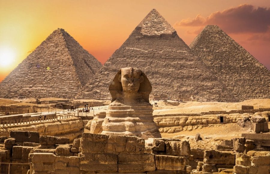 Giza Pyramids and Sphinx at Cairo Egypt during sunset on a memorable Vacation