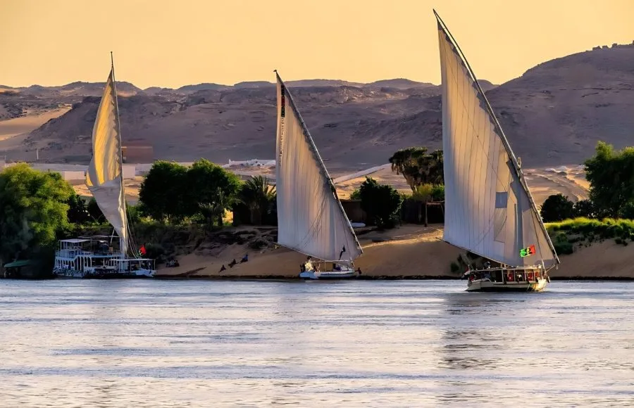 Two traditional Egyptian sailing boats (feluccas) in Aswan.
