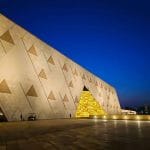 The modern Grand Egyptian Museum near the Giza Pyramids.