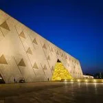 The modern Grand Egyptian Museum near the Giza Pyramids.