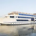 The exterior of the MS Blue Shadow i Nile Cruise ship is docked on the Nile River.
