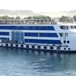 The exterior of the MS Blue Shadow ii Nile Cruise ship sailing on the Nile River.