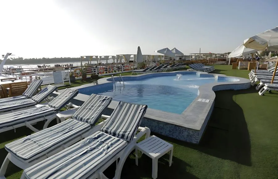 MS Blue Shadow II Nile Cruise ship's pool deck, showing the outdoor swimming pool and multiple lounge chairs.
