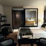 Bright twin-bedded cabin on MS Le Fayan with a river view window.