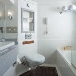 MS Acamar Nile Cruise standard cabin bathroom with a bathtub and shower.