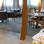 Enjoy delicious meals in the inviting dining area of the MS Al Jamila Nile Cruise ship