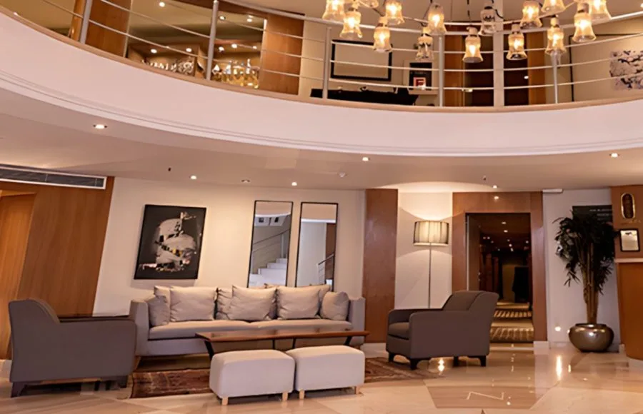 The welcoming reception area of the MS Al Jamila Nile Cruise ship, featuring comfortable seating and a warm atmosphere