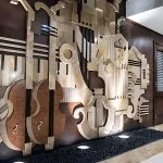 The artistic wall in the Piano Lounge of the MS Concerto.