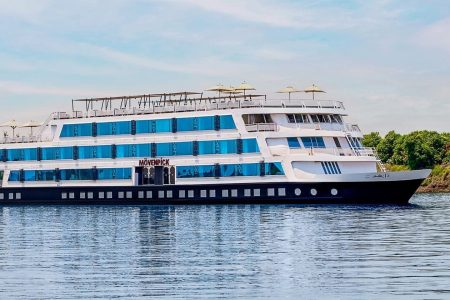 The Elegant Exterior Of The Movenpick Ms Darakum Nile Cruise Prominently Displays The Movenpick Logo With Multiple Decks Of Cabins And A Sunny Top Deck For Leisure