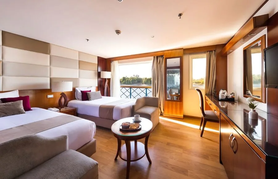 Twin cabin with river view on a Nile cruise ship.