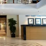 The welcoming reception area of the luxury MS Farida Nile Cruise features a bright, elegant design to greet guests as they embark on their journey.