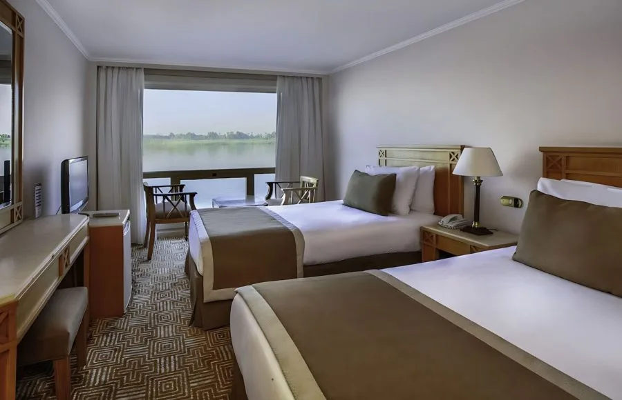 Cabin with twin beds on the Jaz Crown Emperor Nile Cruise.