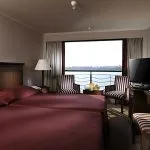 Cabin with twin beds on the Iberotel Crown Empress Cruise.