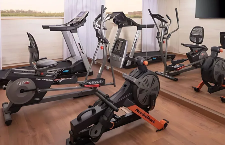 Gymnasium with exercise equipment on the Crown Empress Cruise.