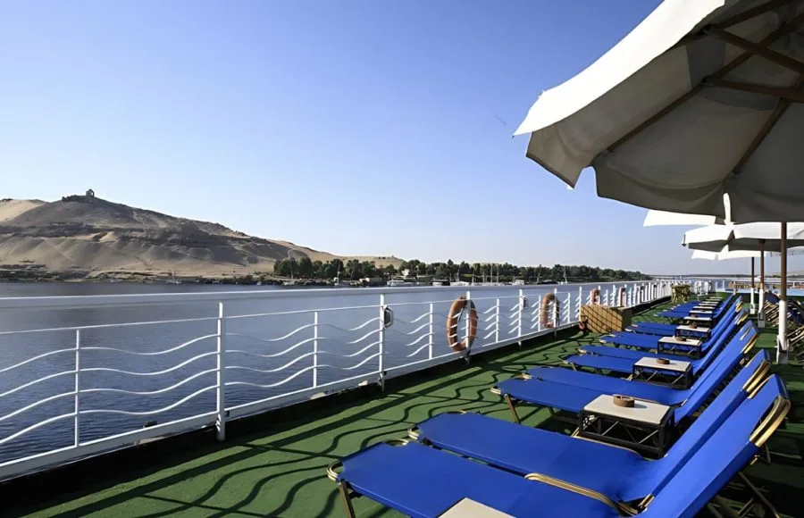Sun deck with loungers and umbrellas on the MS Iberotel Crown Empress Nile Cruise.
