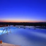 Swimming pool on the Jaz Crown Jewel at sunset.