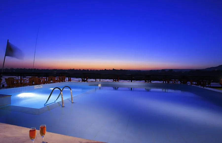 Swimming pool on the Jaz Crown Jewel at sunset.