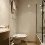 The bathroom on the Jaz Crown Jubilee Nile Cruise with a bathtub.