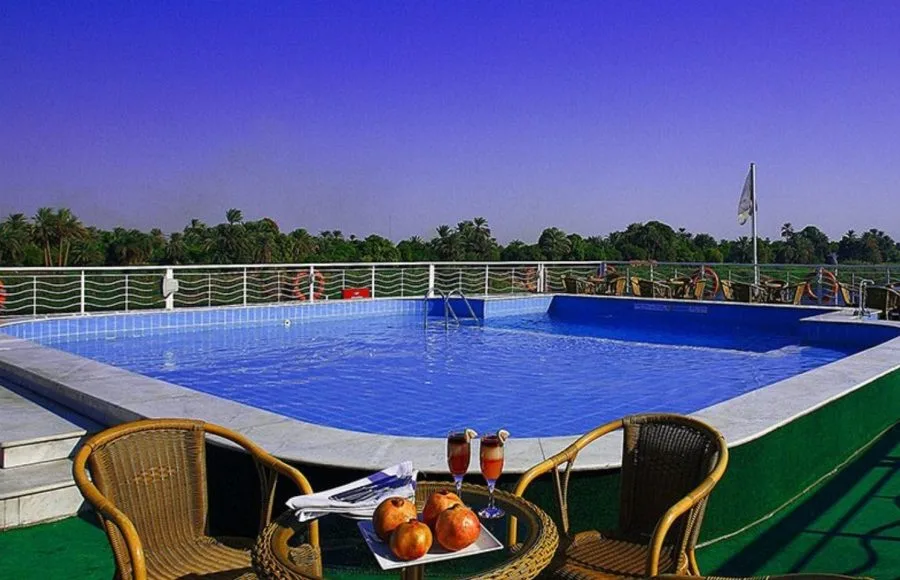 The sundeck pool with a scenic view on the Jaz Crown Jubilee Nile Cruise.