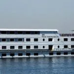 The Jaz Nile Monarch cruise ship sailing on the Nile River.