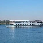 The Jaz Nile Monarch cruise ship sailing on the Nile River.