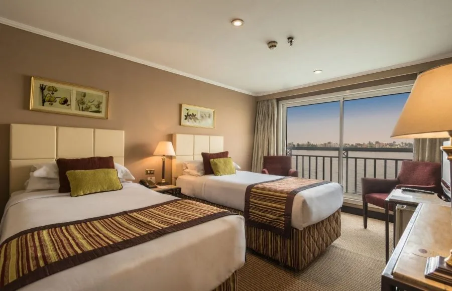 Twin cabin on the Jaz Nile Monarch with a Nile view.