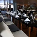 Elegant dining area on MS Le Fayan.
