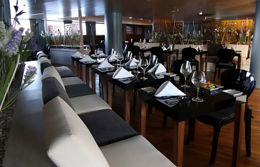 Elegant dining area on MS Le Fayan.