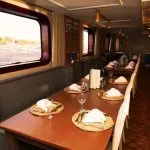 Elegant Dining Room with Nile Views on MS Le Fayan Nile Cruise.
