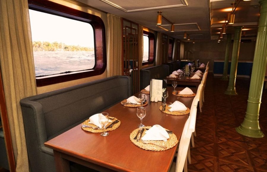 Elegant Dining Room with Nile Views on MS Le Fayan Nile Cruise.