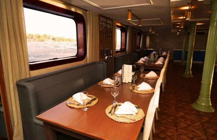 Elegant Dining Room with Nile Views on MS Le Fayan Nile Cruise.