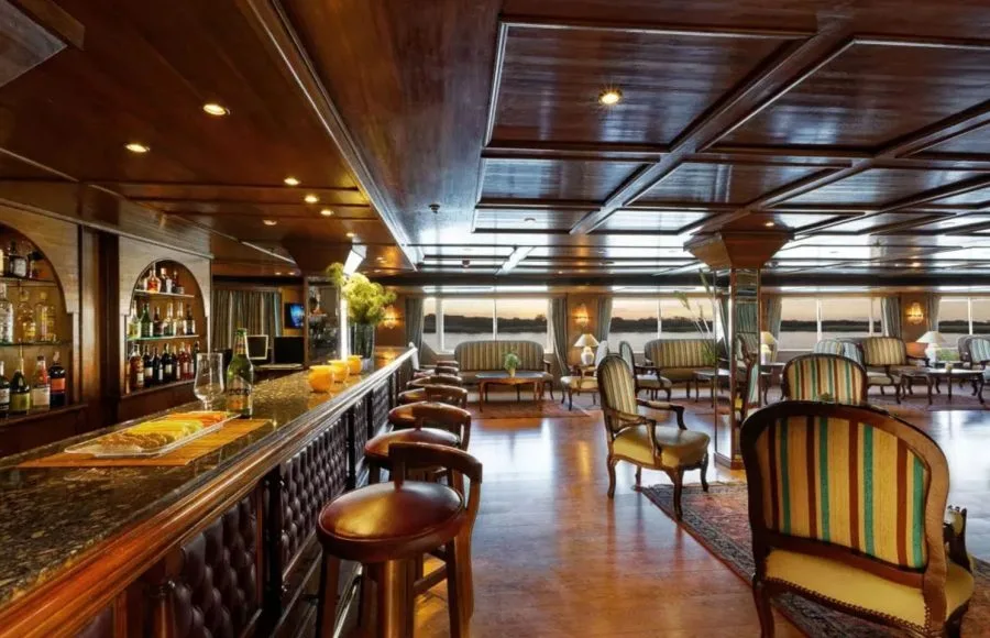 Elegant bar and lounge area with wooden decor on the MS Medea Nile Cruise