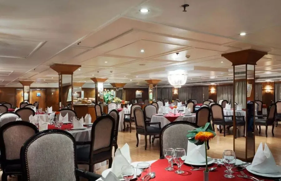 Spacious dining area inside the MS Medea Nile Cruise restaurant with set tables