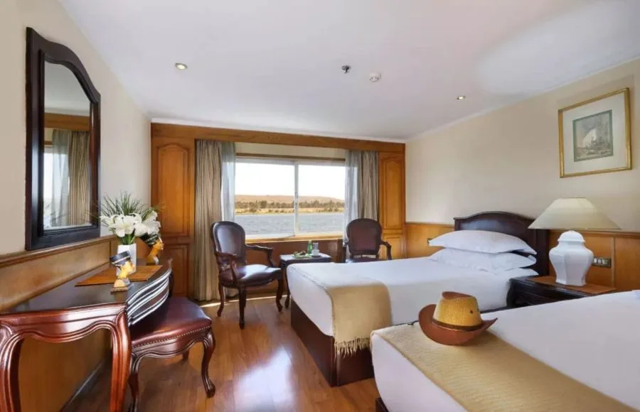 Comfortable twin cabin with a scenic window view on the MS Medea Nile Cruise