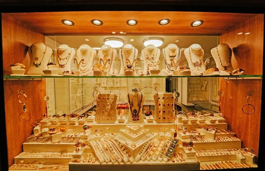 A stunning display of fine gold jewelry in the onboard shop of the MS Miriam nile cruise ship offering memorable souvenirs