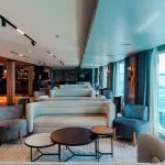 The elegant main lounge and bar area of the MS Miriam Nile Cruise with comfortable seating and panoramic river views