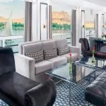 Relax in the elegant lounge of the Movenpick Hamees Nile Cruise while enjoying panoramic views of the Nile River.