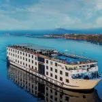 Aerial view of the luxurious Movenpick Royal Lily Nile Cruise ship sailing on the tranquil Nile River