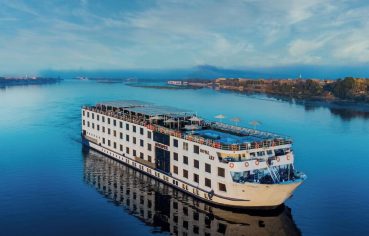 Aerial view of the luxurious Movenpick Royal Lily Nile Cruise ship sailing on the tranquil Nile River